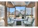 Outdoor patio with fire pit and pergola at 4007 Capensis Ln, Ravenel, SC 29470