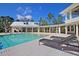 Resort-style pool with plenty of lounge chairs at 4007 Capensis Ln, Ravenel, SC 29470
