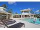 Community pool with lounge chairs and waterfront access at 4007 Capensis Ln, Ravenel, SC 29470