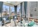 Comfortable screened porch with wicker furniture and surrounding windows at 4007 Capensis Ln, Ravenel, SC 29470