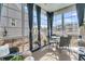 Relaxing screened porch with seating area and view of backyard at 4007 Capensis Ln, Ravenel, SC 29470
