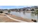 Calm water view with houses and walkway at 4007 Capensis Ln, Ravenel, SC 29470