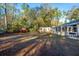 Large backyard with a spacious lawn and shed at 411 Constance St, Walterboro, SC 29488