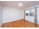 Bright bedroom with hardwood floors and a large window at 411 Constance St, Walterboro, SC 29488