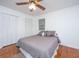 Spacious bedroom with hardwood floors and gray bedding at 411 Constance St, Walterboro, SC 29488