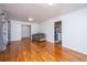 Hardwood floor living room with access to kitchen and hallway at 411 Constance St, Walterboro, SC 29488