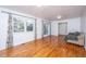 Spacious living room featuring hardwood floors and ample natural light at 411 Constance St, Walterboro, SC 29488