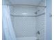 Shower with white subway tile and a white shower curtain at 411 Constance St, Walterboro, SC 29488