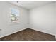 Bright bedroom with a large window and wood-look flooring at 415 Broad Elm Way, Summerville, SC 29486