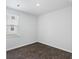 Cozy bedroom with hardwood floors and large window at 415 Broad Elm Way, Summerville, SC 29486