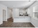 Modern kitchen features granite countertops and stainless steel appliances at 415 Broad Elm Way, Summerville, SC 29486