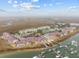 Wide aerial view of waterfront community and marina at 48 Mariners Cay Dr, Folly Beach, SC 29439