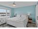 Main bedroom with a king bed and water views at 48 Mariners Cay Dr, Folly Beach, SC 29439