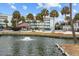Peaceful pond view with fountain and palm trees at 48 Mariners Cay Dr, Folly Beach, SC 29439