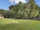 Large fenced backyard with lush green grass at 506 Gross Ave, Moncks Corner, SC 29461