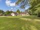 Spacious backyard with a detached garage at 506 Gross Ave, Moncks Corner, SC 29461