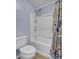 Shower/tub combo with a white toilet at 506 Gross Ave, Moncks Corner, SC 29461