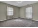 Simple bedroom with neutral walls and carpet at 506 Gross Ave, Moncks Corner, SC 29461