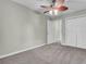 Simple bedroom with ceiling fan and double door closet at 506 Gross Ave, Moncks Corner, SC 29461