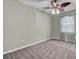 Spacious bedroom with a ceiling fan and large window at 506 Gross Ave, Moncks Corner, SC 29461