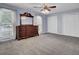 Bright bedroom with ample closet space and neutral carpeting at 506 Gross Ave, Moncks Corner, SC 29461