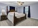 Spacious bedroom with a large bed, ceiling fan, and ample natural light at 506 Gross Ave, Moncks Corner, SC 29461