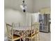 Charming dining room with an oval table and floral tablecloth at 506 Gross Ave, Moncks Corner, SC 29461