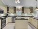 Spacious kitchen featuring an island, stainless steel appliances, and ample cabinetry at 506 Gross Ave, Moncks Corner, SC 29461