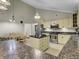 Open concept kitchen with island and stainless steel appliances at 506 Gross Ave, Moncks Corner, SC 29461