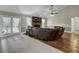 Living room with hardwood floors, a fireplace, and a sectional sofa at 506 Gross Ave, Moncks Corner, SC 29461