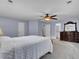 Spacious main bedroom with neutral walls and ceiling fan at 506 Gross Ave, Moncks Corner, SC 29461
