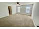 Spacious bedroom with carpet and large windows at 515 Purple Finch Rd, Summerville, SC 29486