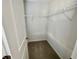Walk-in closet with wire shelving and neutral carpet at 515 Purple Finch Rd, Summerville, SC 29486