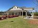Community clubhouse featuring a pergola and landscaping at 515 Purple Finch Rd, Summerville, SC 29486