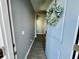 Gray hallway with light gray walls, and wood-look flooring at 515 Purple Finch Rd, Summerville, SC 29486