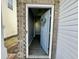 Open blue front door with a wreath, leading into a gray hallway at 515 Purple Finch Rd, Summerville, SC 29486