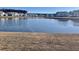 Serene lake view with calm water and residential homes at 515 Purple Finch Rd, Summerville, SC 29486