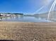 Tranquil lakefront property with homes in background at 515 Purple Finch Rd, Summerville, SC 29486