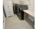 Bright laundry room with washer, dryer, and storage at 515 Purple Finch Rd, Summerville, SC 29486