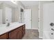 Clean bathroom with updated vanity and tile flooring at 5211 Fernland Way, North Charleston, SC 29420