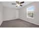 Charming bedroom with neutral decor and a window at 5211 Fernland Way, North Charleston, SC 29420