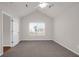 Bright bedroom featuring neutral walls and carpet, plus a ceiling fan at 5211 Fernland Way, North Charleston, SC 29420