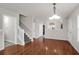 Hardwood floor dining room with open concept to kitchen at 5211 Fernland Way, North Charleston, SC 29420