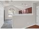 Kitchen with dark wood cabinets, granite countertops and black appliances at 5211 Fernland Way, North Charleston, SC 29420