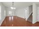 Spacious living room featuring hardwood floors and lots of natural light at 5211 Fernland Way, North Charleston, SC 29420