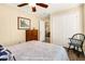 Bedroom with a double bed, dresser, and spacious closet at 609 Palmetto Blvd, Edisto Beach, SC 29438