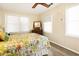 Bedroom with a queen bed and ceiling fan at 609 Palmetto Blvd, Edisto Beach, SC 29438