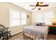 Bright bedroom with a comfortable bed and plenty of natural light at 609 Palmetto Blvd, Edisto Beach, SC 29438