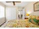 Bedroom with a queen bed and access to hallway at 609 Palmetto Blvd, Edisto Beach, SC 29438