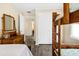 Bedroom with twin beds, dresser, and access to hallway at 609 Palmetto Blvd, Edisto Beach, SC 29438